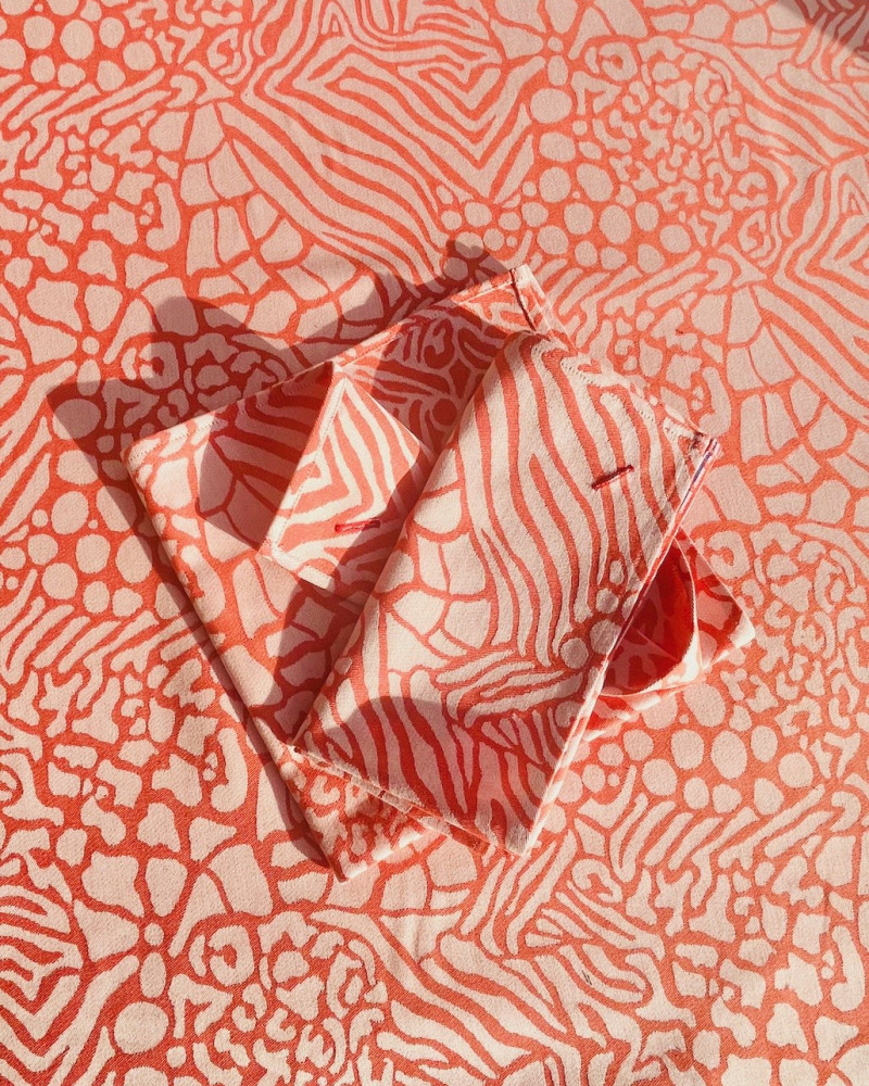 jacquard savane mandarine 100% coton - made in France - ici avec serviette assortie jacquard savane mandarine 100% coton - made in France - ici avec serviette assortie